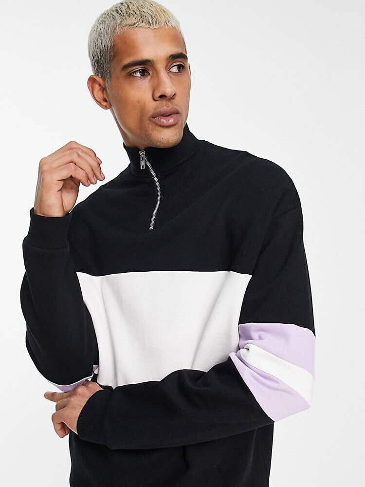 ASOS DESIGN – Oversize-Sweatshirt in Schwarz-Weiß mit halblangem Reißverschluss und Farbblockdesign