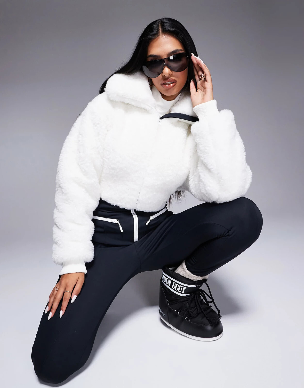 ASOS 4505 Ski suit with faux fur panels and skinny leg in black and white