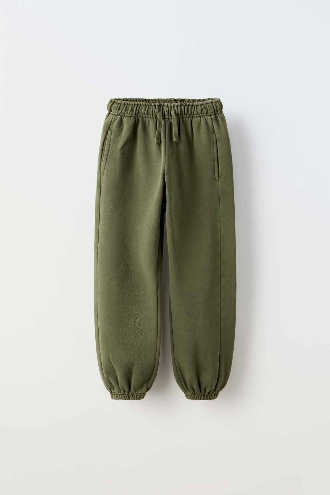 Faded jogging trousers
