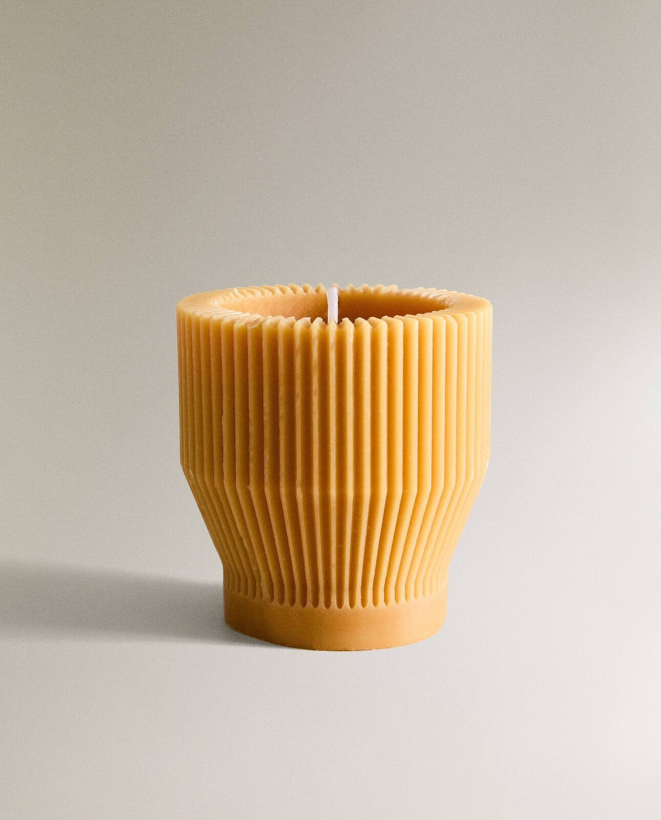 Striped cylindrical decorative candle