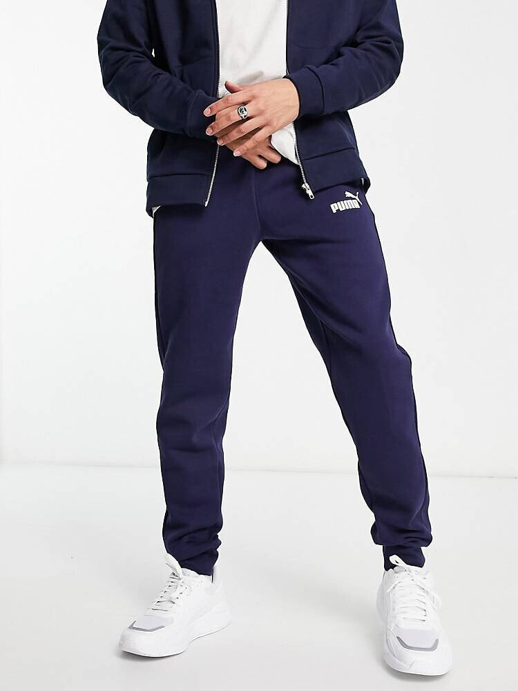 Puma – Essentials – Schmal geschnittene Jogginghose mit kleinem Logo in Marineblau