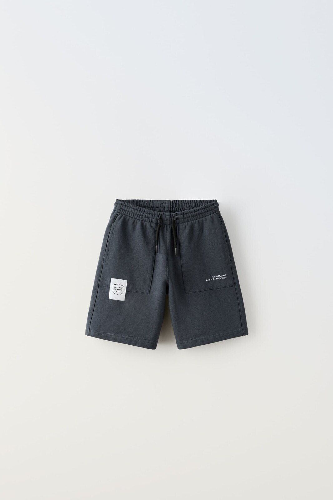 Jogging bermuda shorts with label detail
