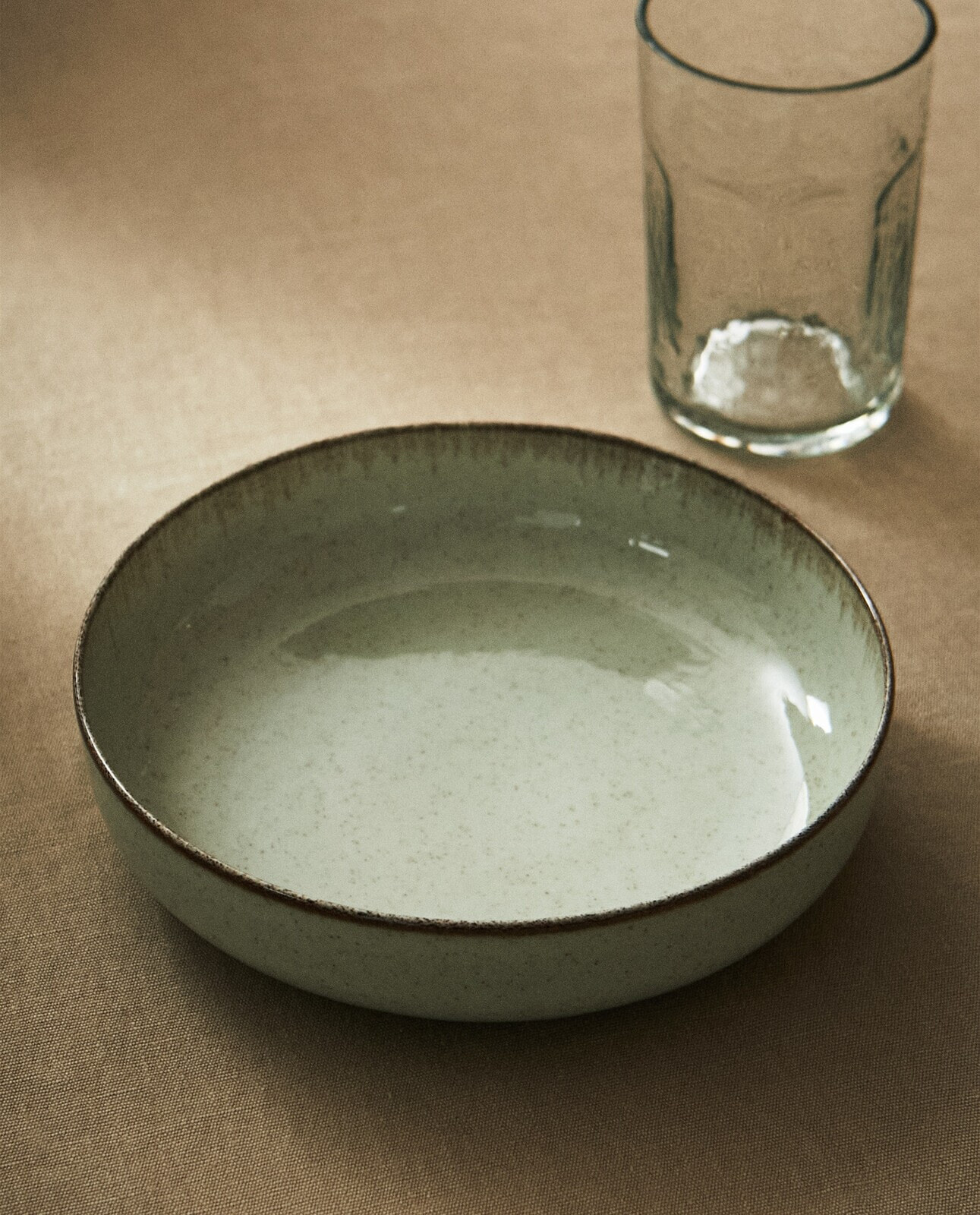 Porcelain soup plate with antique finish rim