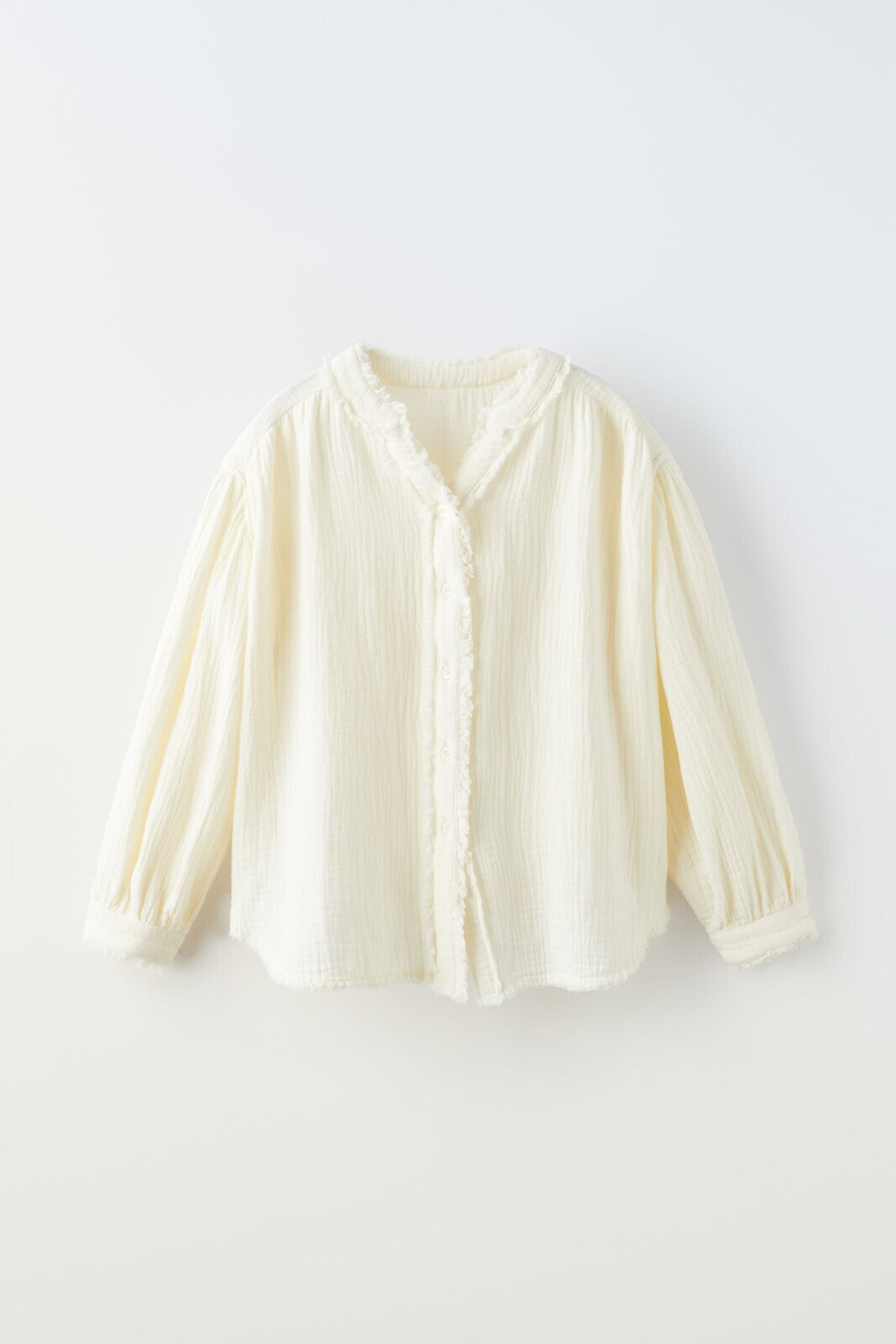 Textured shirt with frayed details