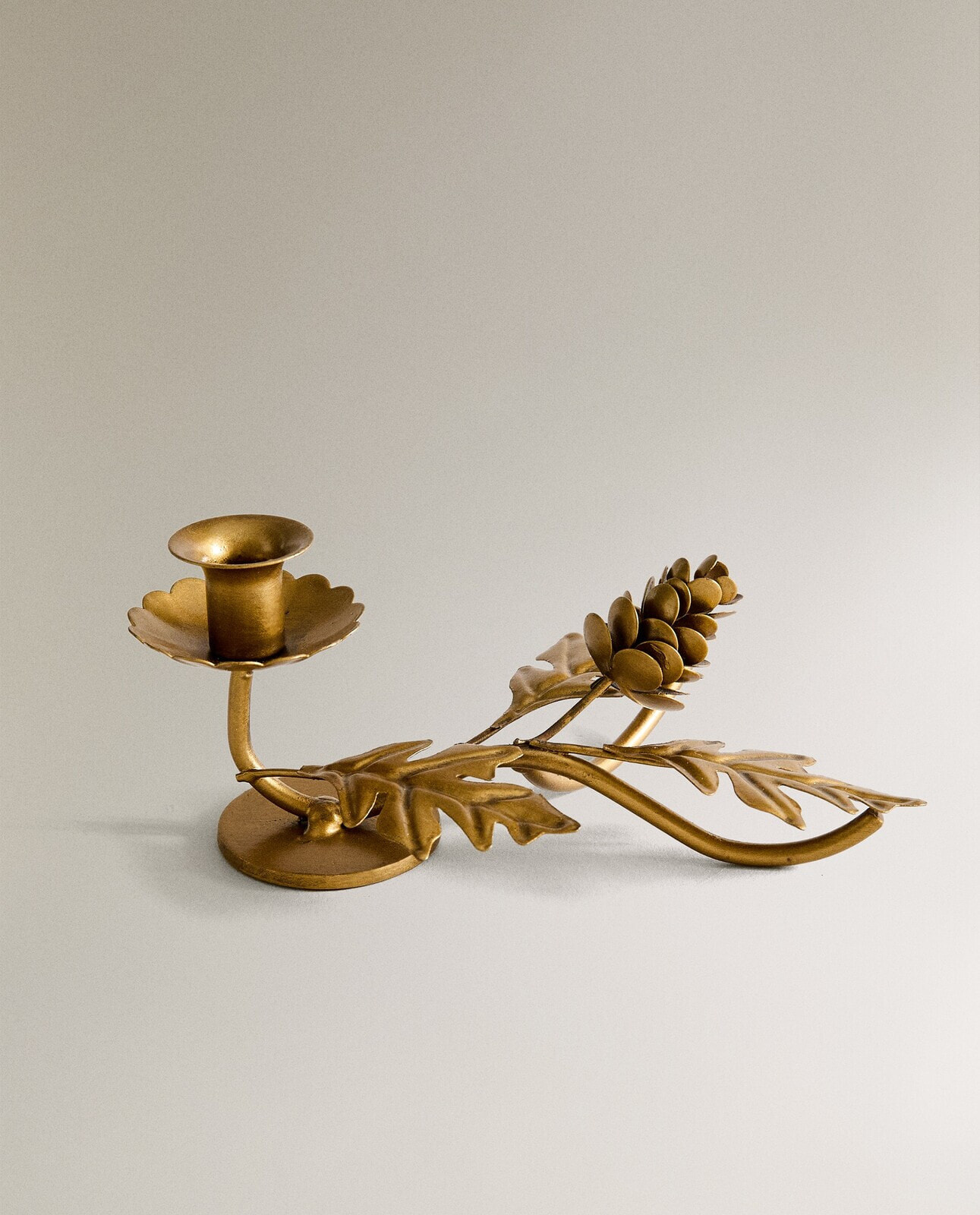 Christmas metal candlestick with leaves