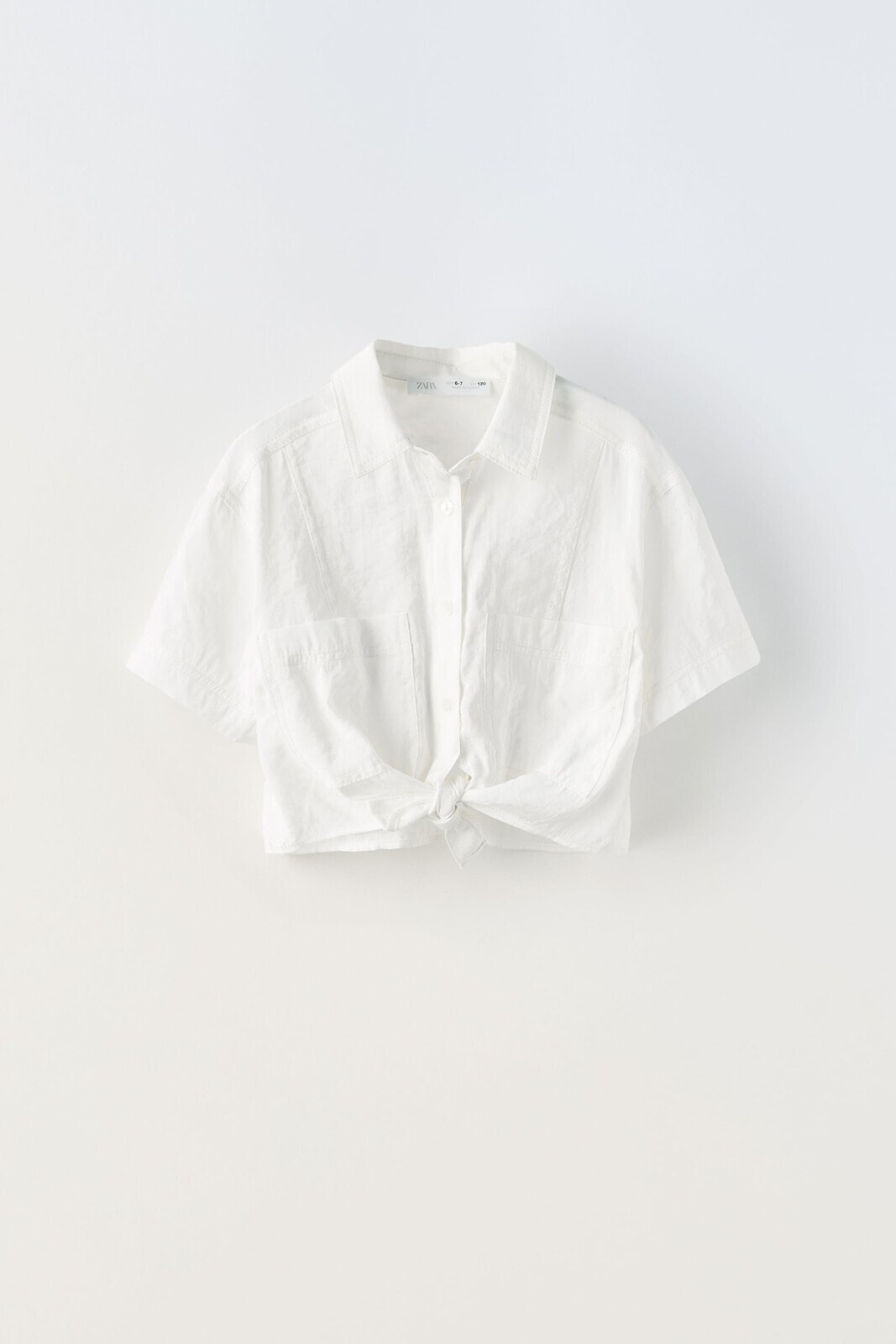 Flowing shirt with knot