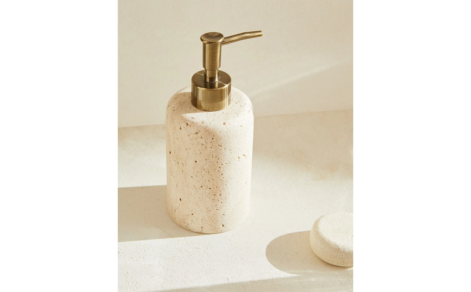 Beige marble bathroom dispenser