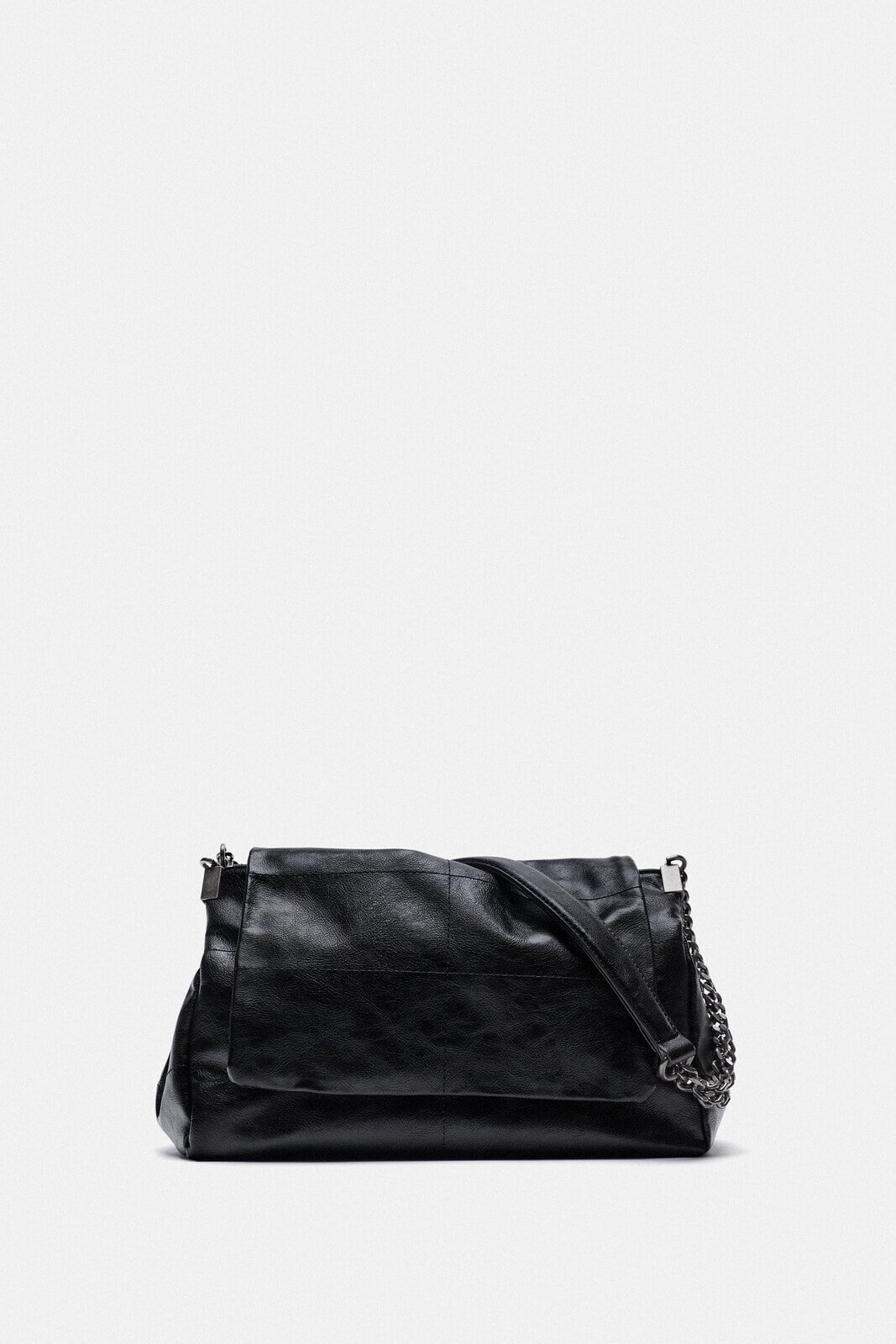 Rocker shoulder bag with flap