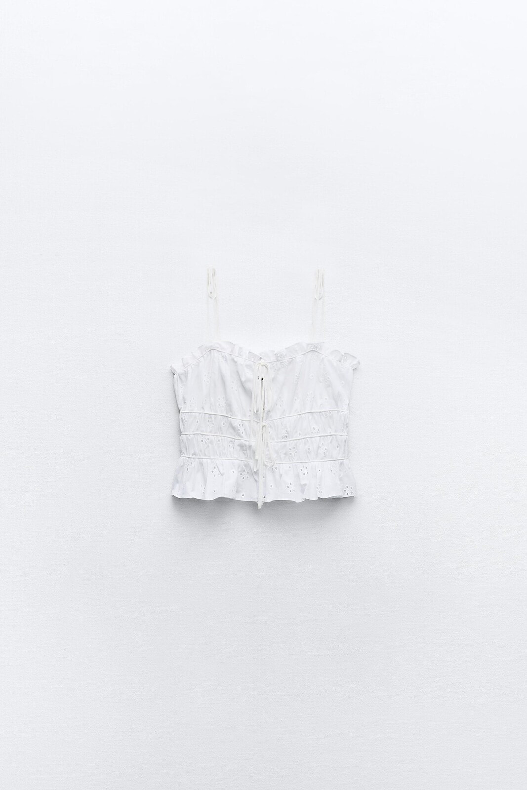 Top with cutwork embroidery and bows