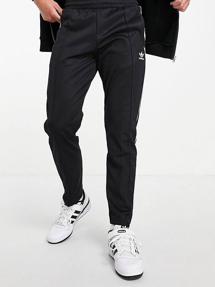 adidas Originals Beckenbauer track pants in black спортивные костюмы V67809708Цвет: Черный; Размер: M купить по выгодной цене от 10343 руб. в интернет-магазине market.litemf.com с доставкой