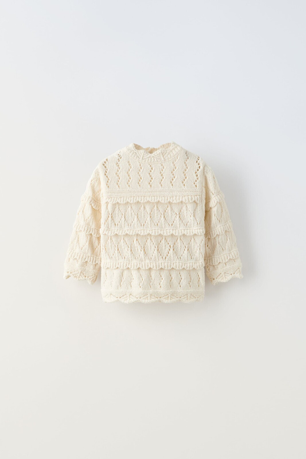 Textured ruffled sweater