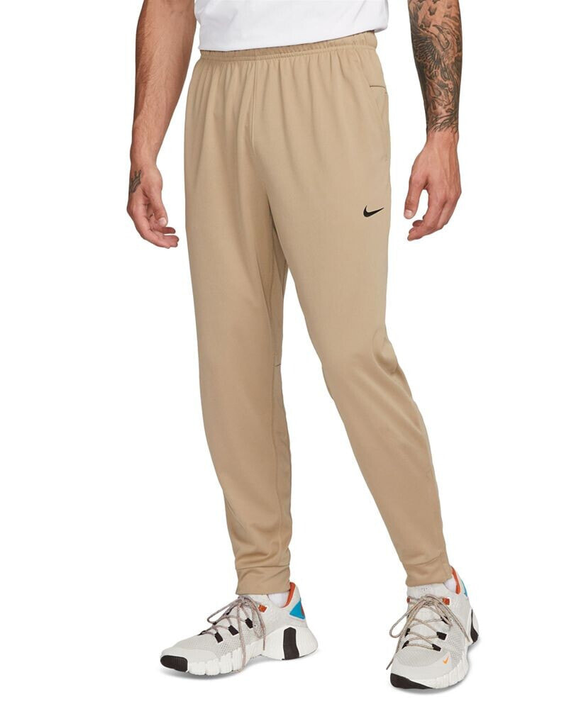 Nike men's Totality Dri-FIT Tapered Versatile Pants