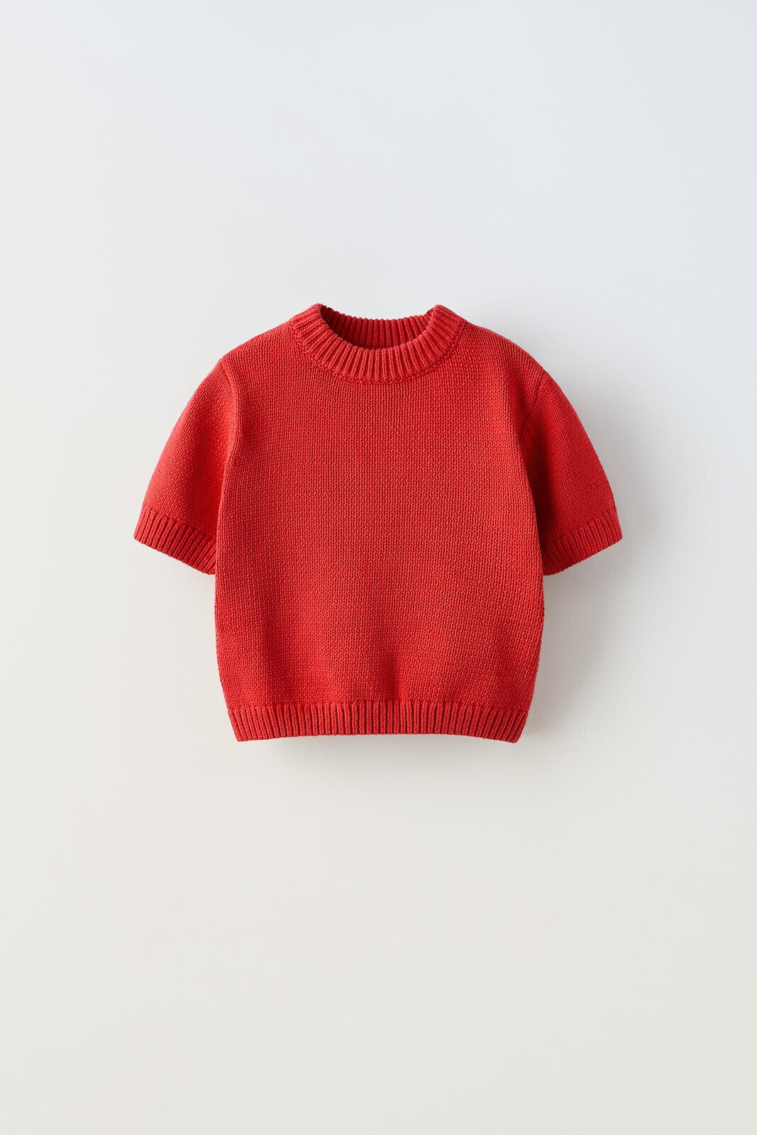 Short sleeve knit sweater