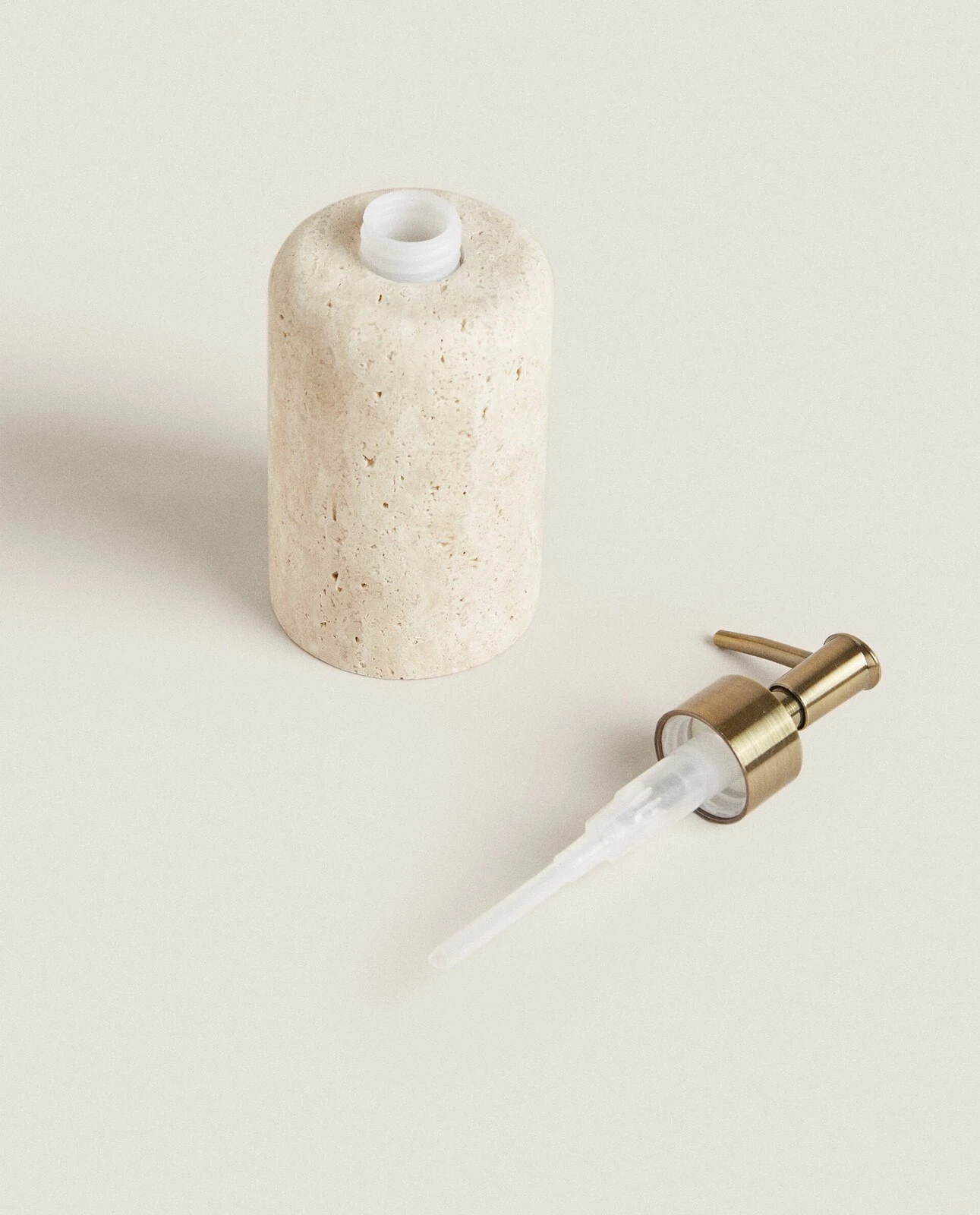 Beige marble bathroom dispenser