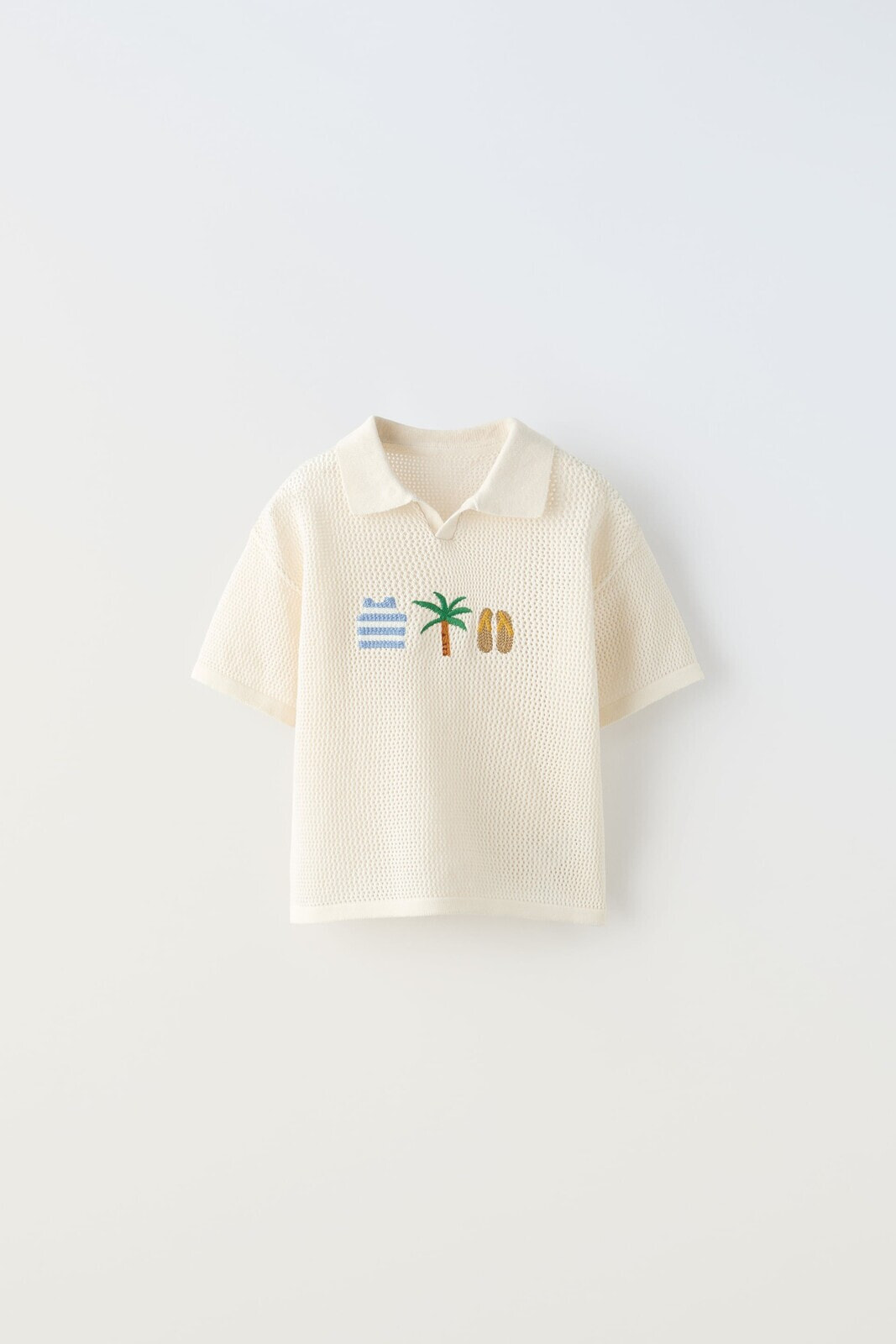 Knit polo shirt with beach embroidery