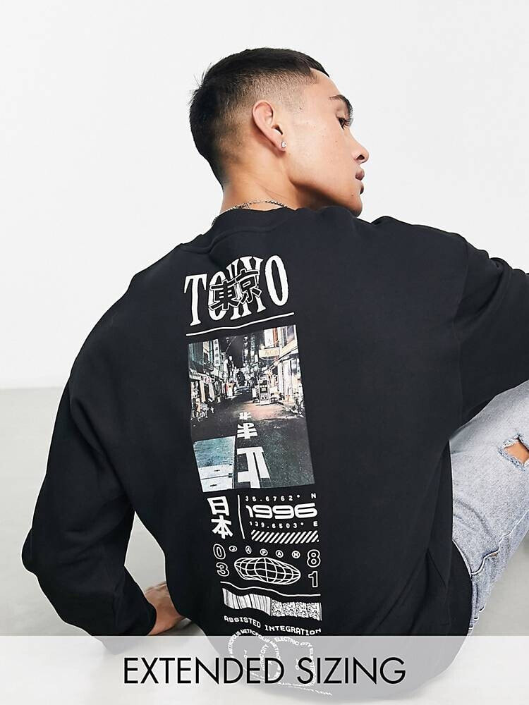 ASOS DESIGN – Oversize-Sweatshirt in Schwarz mit Foto-Print entlang der Wirbelsäule und vorne
