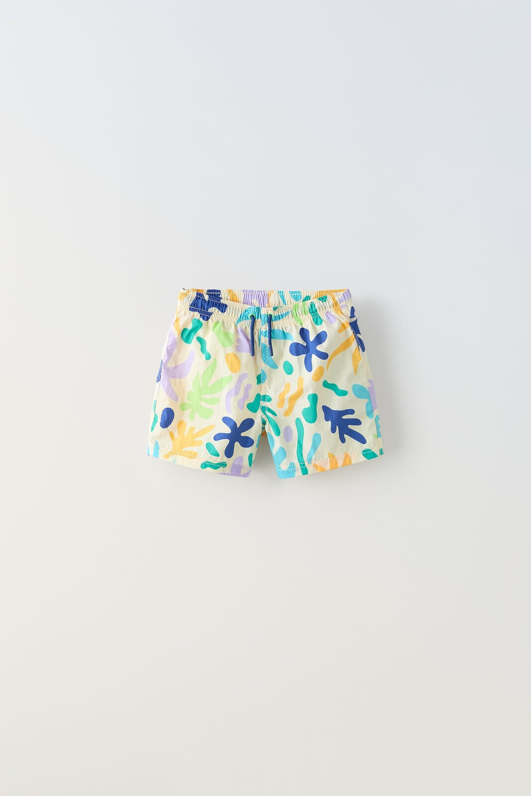 6-14 years/ swim shorts with sun and leaf print