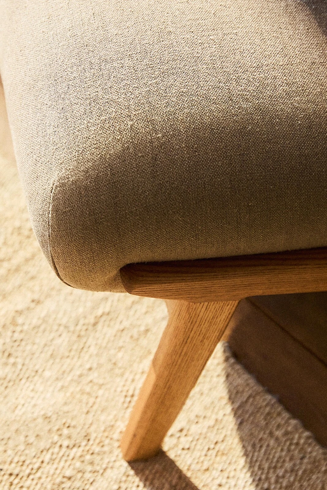 Armchair upholstered in linen