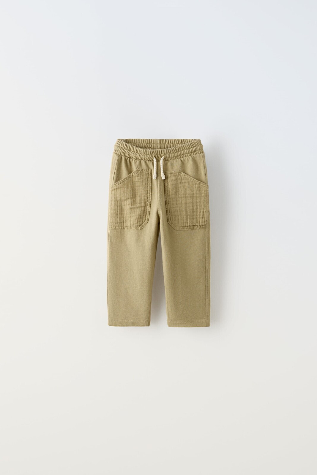 Trousers with textured pockets