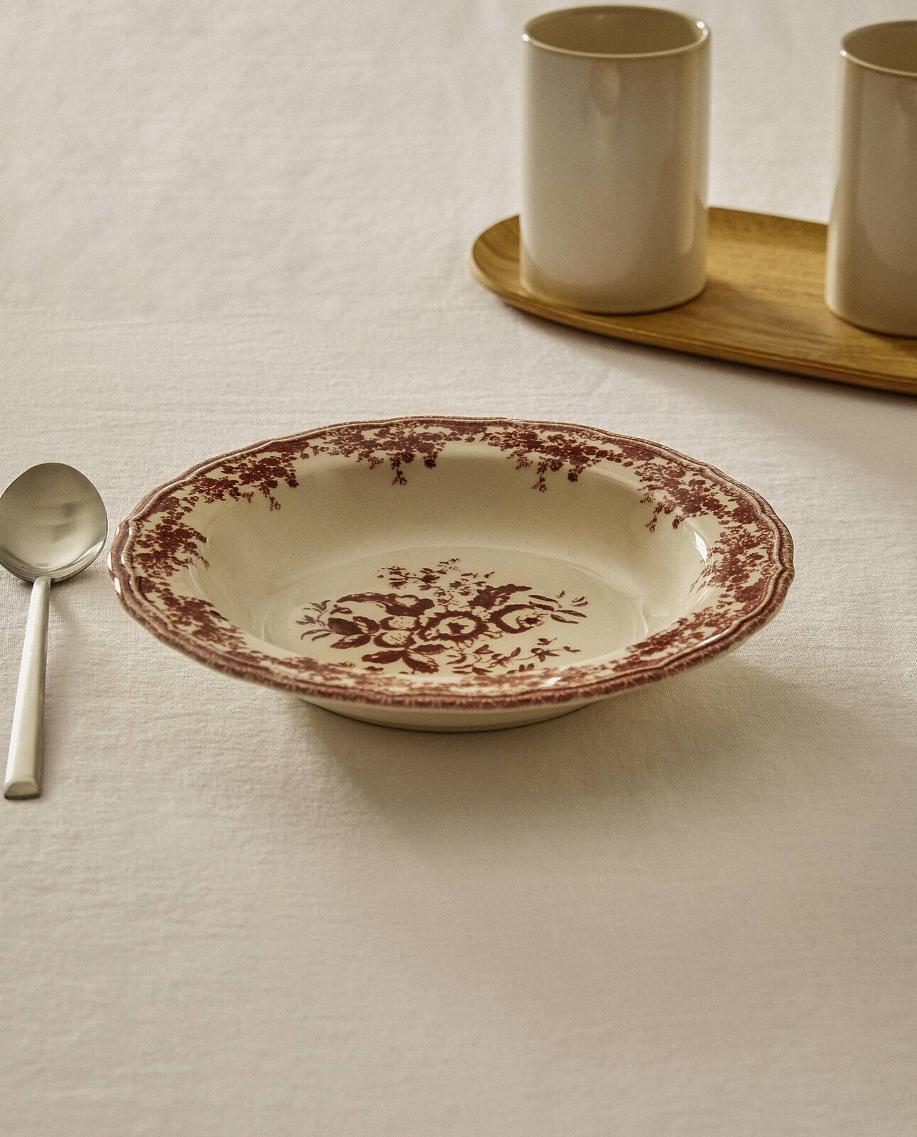 Floral earthenware soup plate