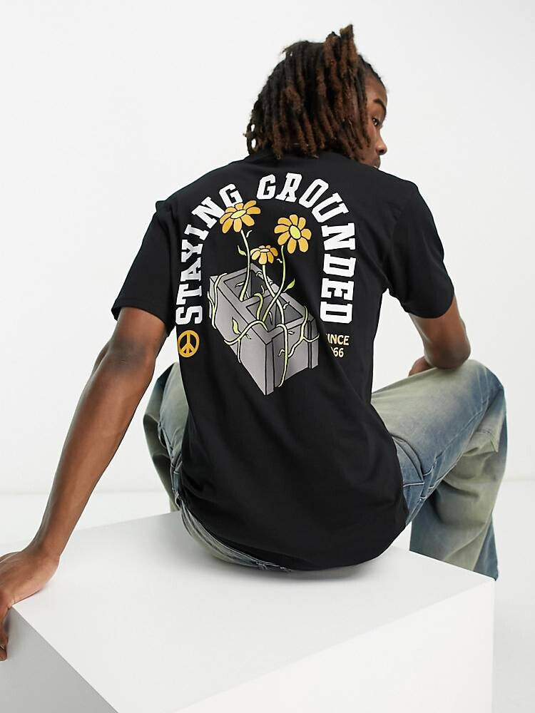 Vans – T-Shirt in Schwarz mit „Staying Grounded“-Rückenprint