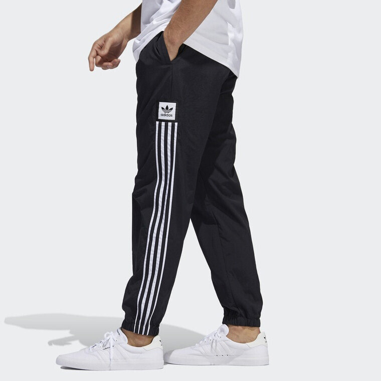 Штаны originals. Брюки спортивные adidas Originals fm9896. Брюки спортивные adidas Originals track Pants. Штаны адидас Ориджиналс. Штаны adidas Originals Wind track.