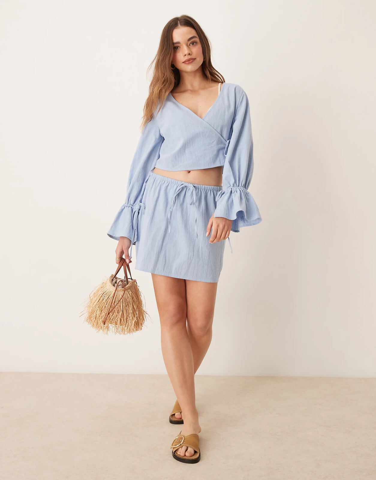 ASOS DESIGN Fern frayed mini beach skirt in ice blue