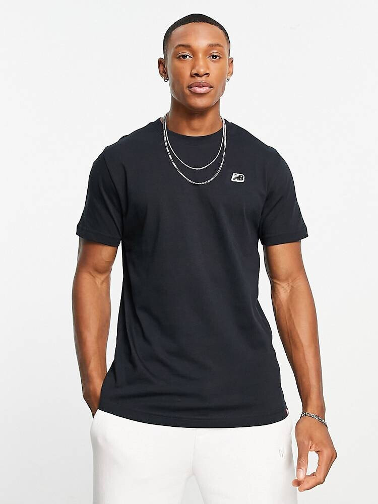 New Balance – Schwarzes T-Shirt mit kleinem Logo
