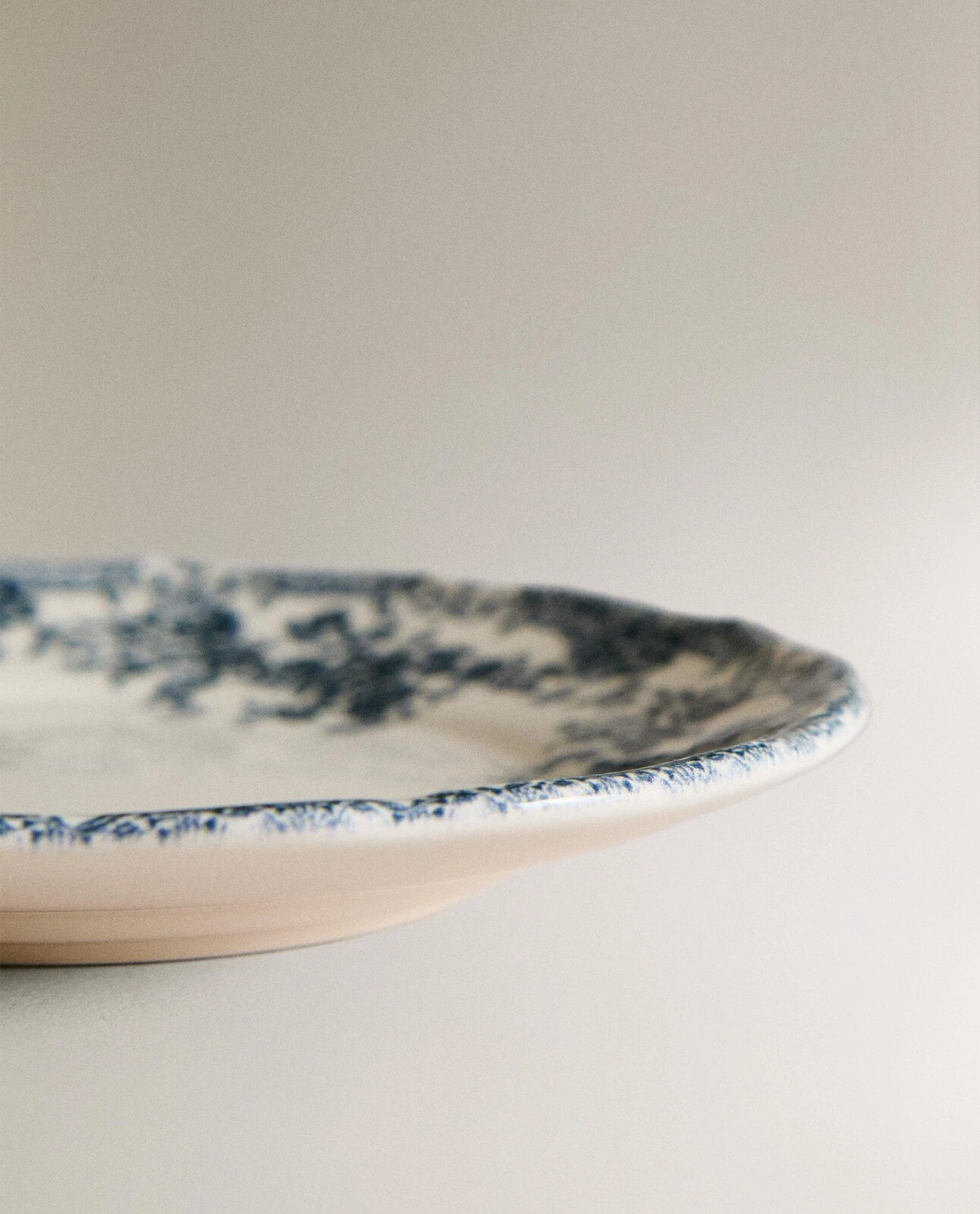 Floral earthenware side plate