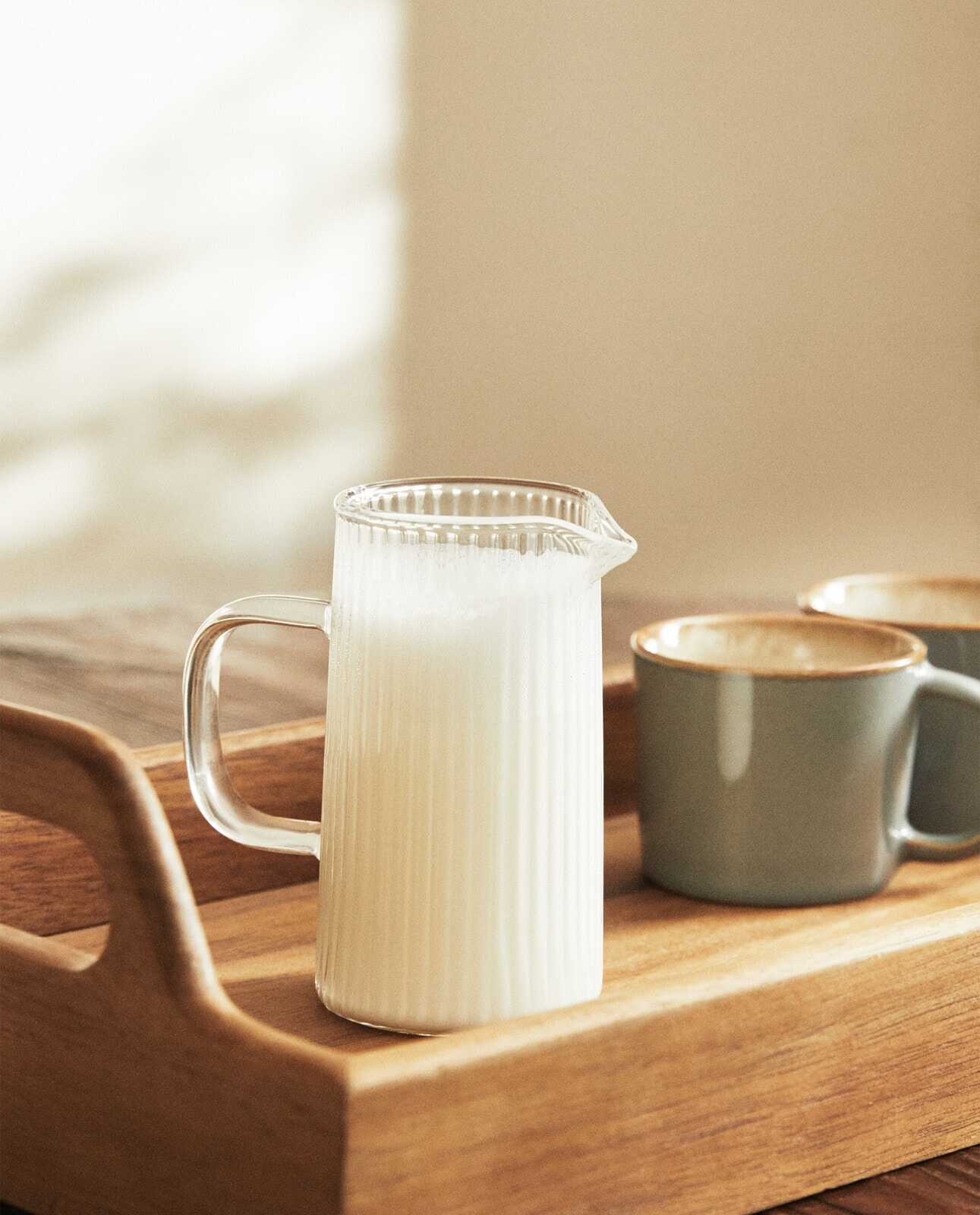 Raised borosilicate milk jug