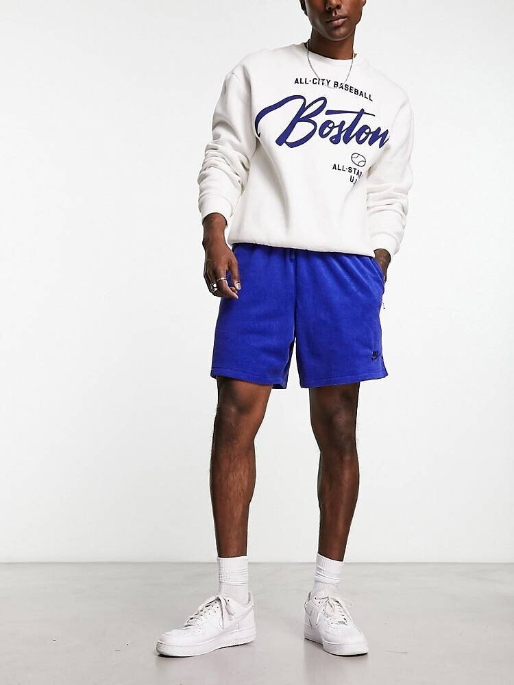 Nike – Club – Frottee-Shorts in Blau