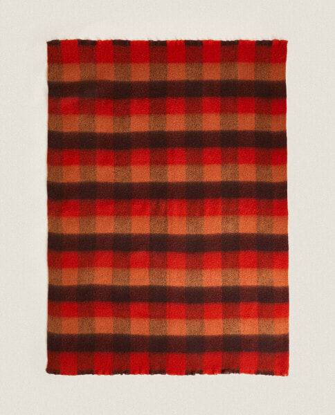 Frayed checked throw