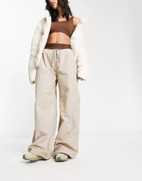 ASOS DESIGN parachute cargo trousers in stone