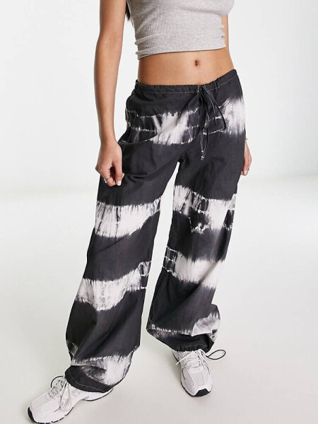 ASOS DESIGN parachute cargo trouser in tie dye print