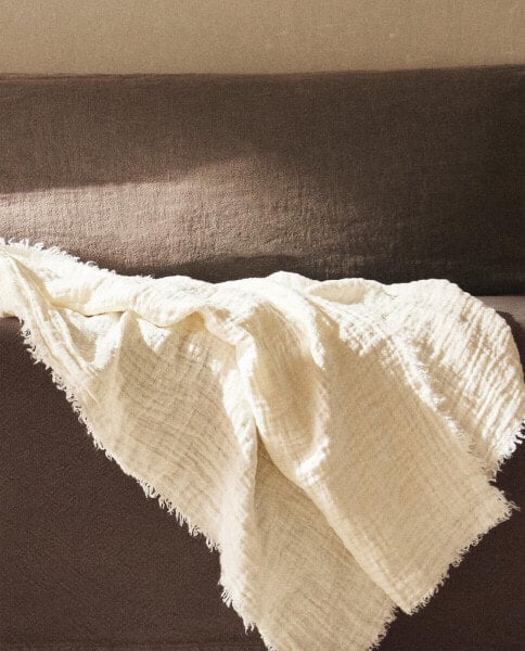 Fringed linen throw