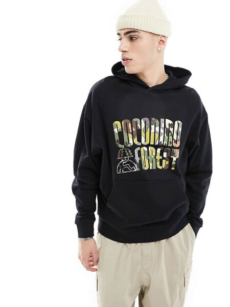 ASOS DESIGN oversized hoodie in black with multicoloured front print