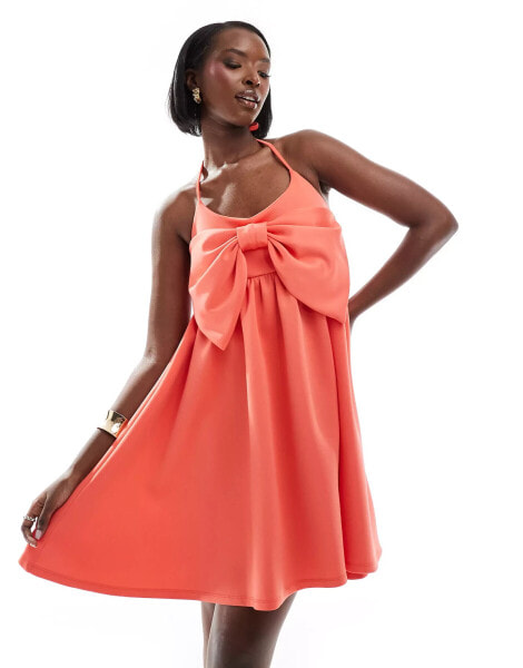 ASOS DESIGN strappy babydoll mini dress with oversized bow in coral