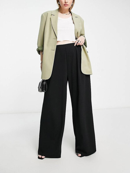 ASOS DESIGN Curve wide leg jersey suit trouser in black