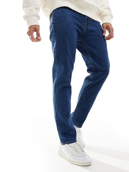 Tommy Jeans regular tapered dad jeans in dark wash 