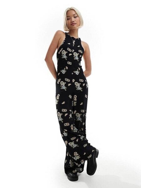 Reclaimed Vintage sleeveless jumpsuit in black floral