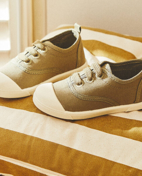 Lace-up fabric trainers