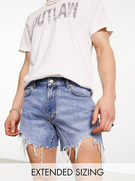 ASOS DESIGN denim shorts in lightwash with rip detail and raw hem in shorter length