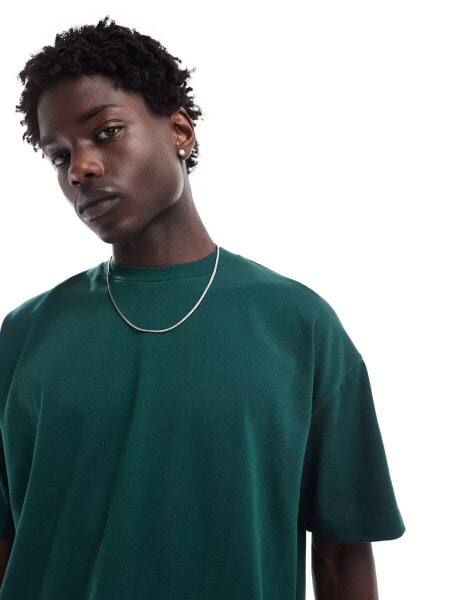 ASOS DESIGN oversized heavyweight t-shirt with pocket detail in dark green