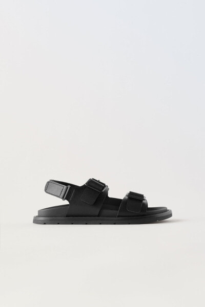 Sandals with buckles