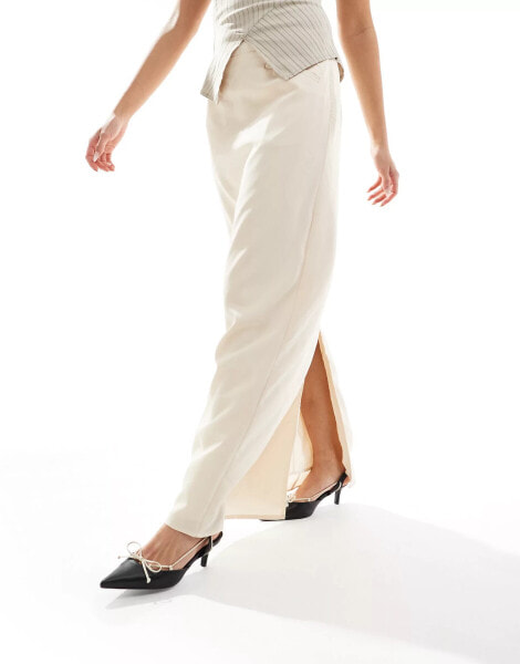 NA-KD x Laura Jane Stone maxi skirt with front pockets and back split detail in beige