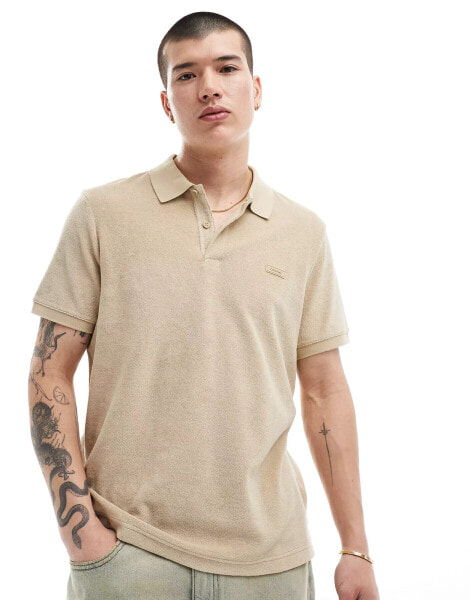 Calvin Klein towelling polo in tan