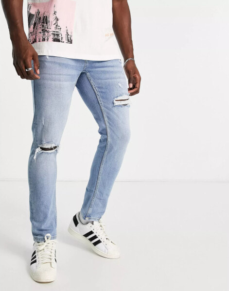 Pull&Bear – Schmale Jeans in Blau mit Zierrissen