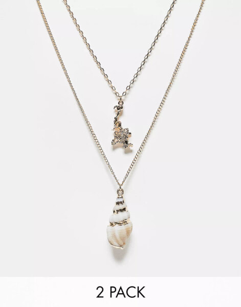 ASOS DESIGN 2 pack necklace set with faux shell and pendant in gold tone