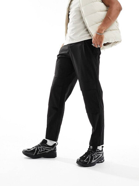 ADPT balloon fit cargo trousers in black 