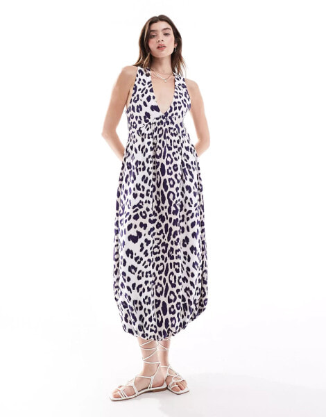 ASOS DESIGN puff ball midi smock dress with v-neck in leopard print